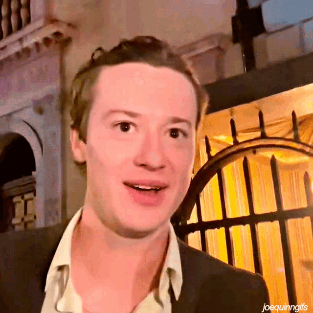 a close up of a man 's face with the words joequinngifs written below it