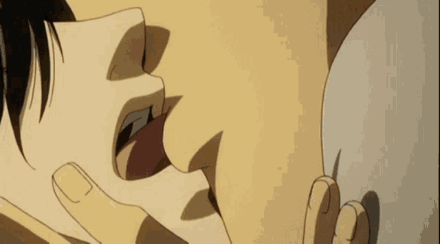 a close up of a person kissing another person 's chest