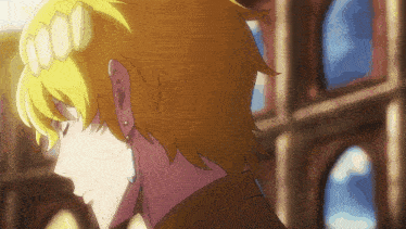 a close up of a person with yellow hair
