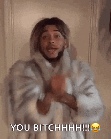 a man in a fur coat is saying you bitchhhh !!