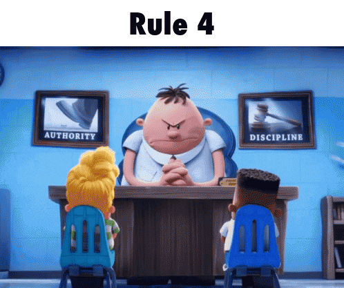 a cartoon character sitting at a desk with rule 4 written on the top