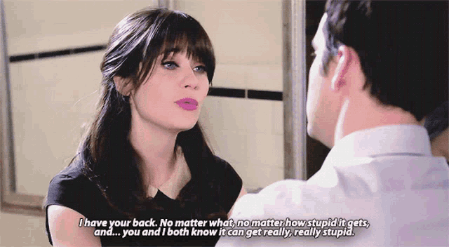 a man and a woman are looking at each other and the woman says i have your back