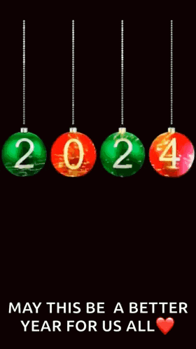 a happy new year greeting card with christmas balls hanging from a string
