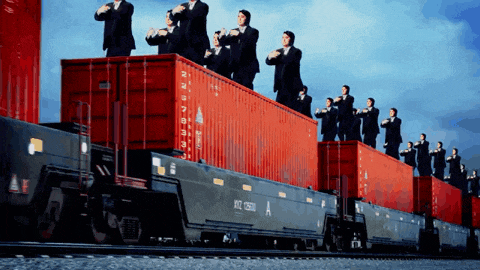 a group of men are standing on top of a train car that says rock creek a