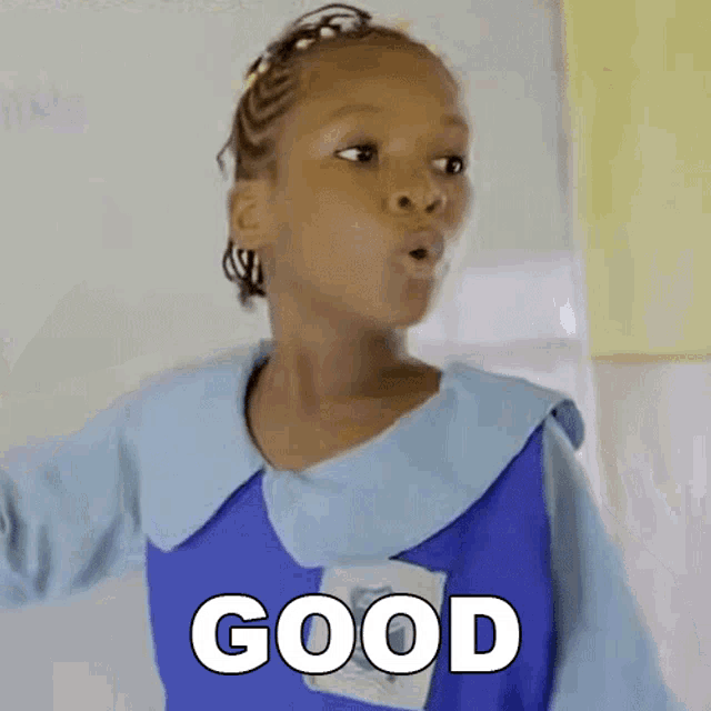 a little girl in a blue uniform is making a funny face and the word good is above her