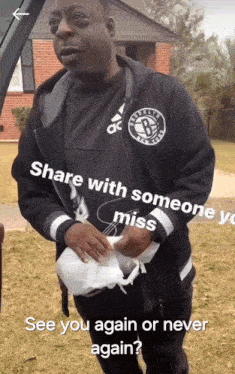 a man wearing a brooklyn nets hoodie is asking if he can share with someone who misses him