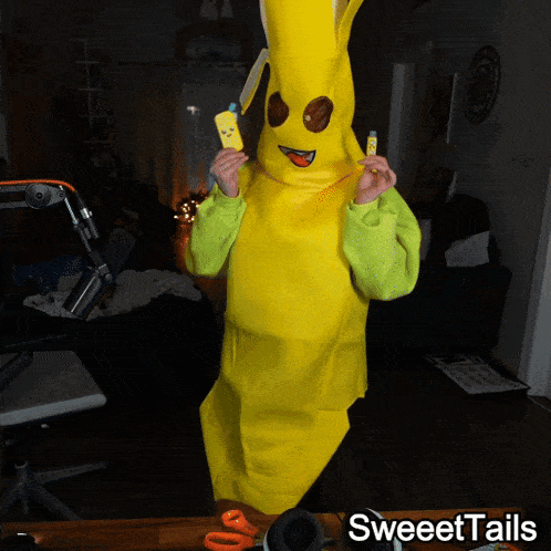 a person dressed in a banana costume with sweettails written below them