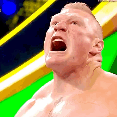 a close up of a man 's face with his mouth open