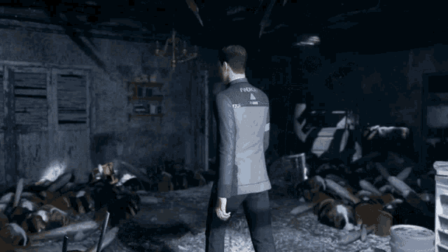 a man in a suit is walking through a room with dogs
