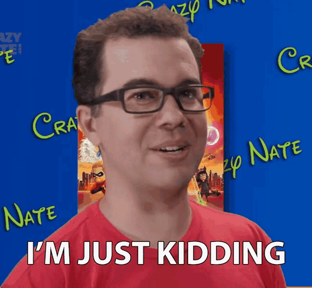 a man with glasses and a red shirt says " i 'm just kidding "