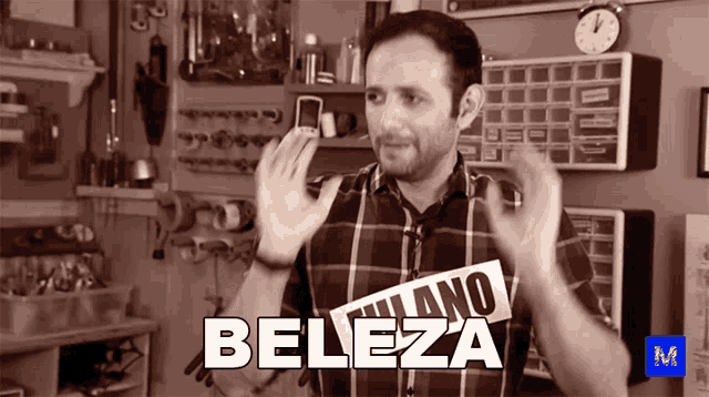 a man in a plaid shirt has the word beleza written on his shirt