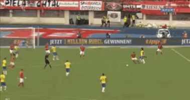 a soccer game is being played in front of a banner that says jetzt 1 million