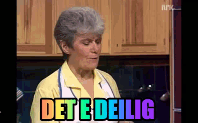a woman in a kitchen with the words det e deilig written in rainbow colors