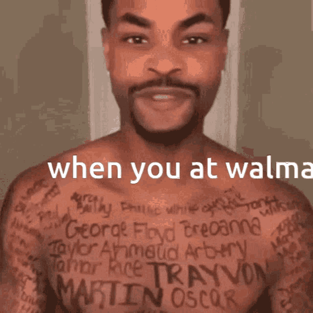 a man without a shirt has a lot of tattoos on his chest including the name martin oscar