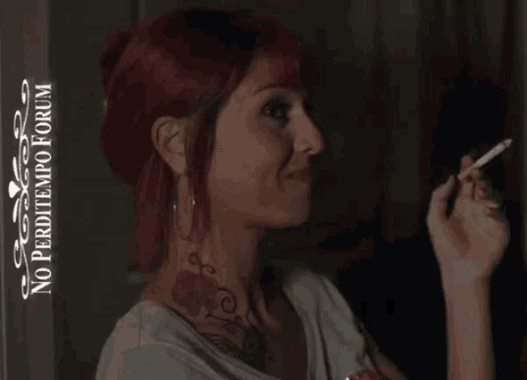 a woman smoking a cigarette with the words no perditempo forum on the bottom
