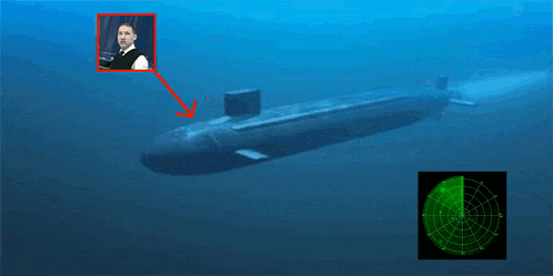 a picture of a man standing next to a submarine