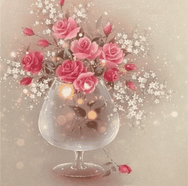 a vase filled with pink roses and baby 's breath on a table .