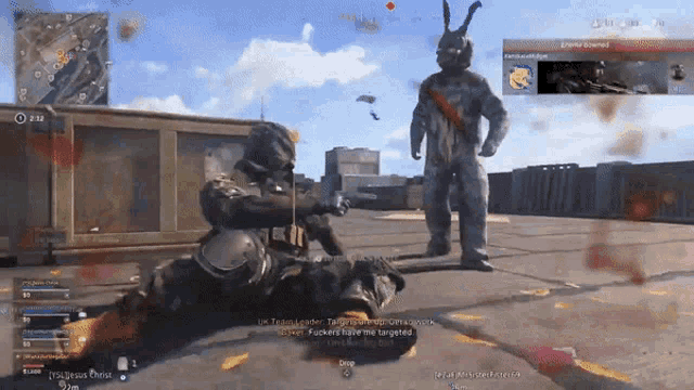 a screenshot of a video game shows a man laying on the ground with a gun