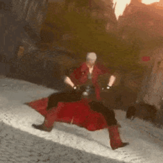 a man in a red coat is riding a horse in the snow .