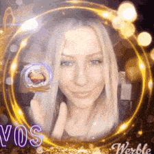 a woman with blonde hair is smiling and giving a thumbs up in a circle surrounded by glowing lights .