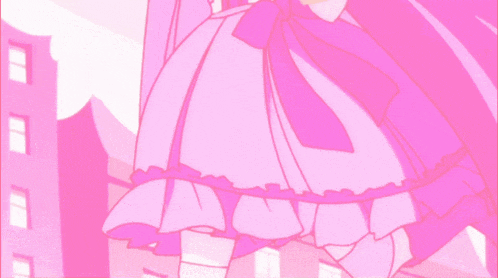 a girl in a pink dress is holding a box in her hands