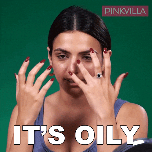 a woman covering her face with her hands and the words " it 's oily " above her