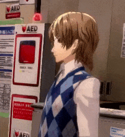 a man in a plaid vest is standing in front of a sign that says aed