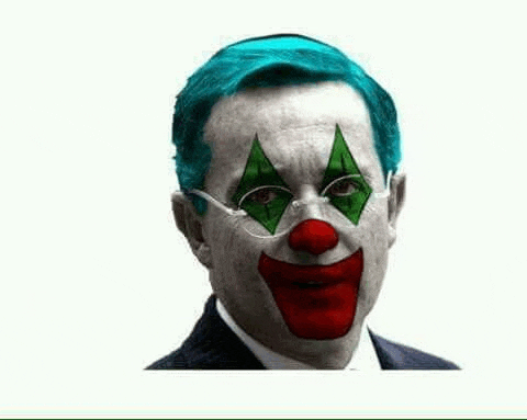 a man with blue hair and glasses is wearing a clown costume .