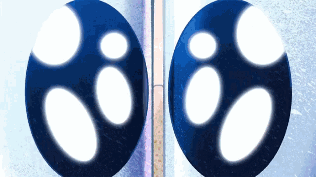 a pair of blue circles with white circles on them