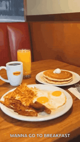 a table topped with plates of food and a cup of coffee with the words " wanna go to breakfast " on the bottom