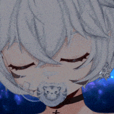 a girl with a pacifier in her mouth has a cross necklace around her neck