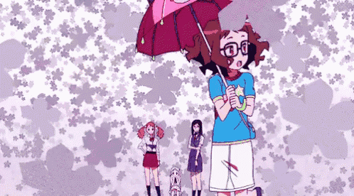 a girl with glasses is holding an umbrella in front of a pattern of flowers