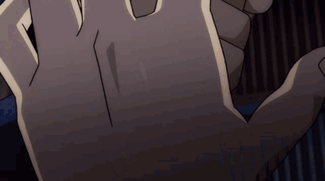 a close up of a person 's hand with a diagonal line