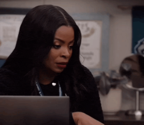 a woman with a lanyard around her neck that says " i love you "