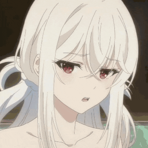 a white haired anime girl with red eyes is looking at the camera