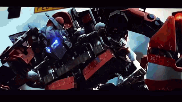 a robot with a blue light on it 's head has the letter y on it