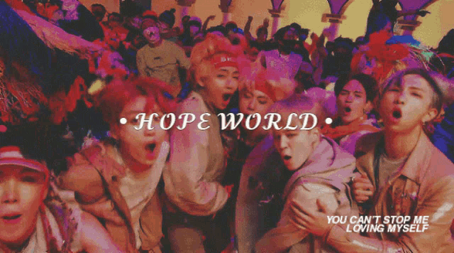 a group of people are standing in front of a sign that says " hope world "