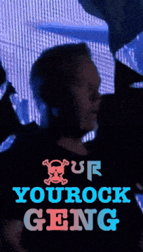 a man is wearing a shirt that says your rock gang