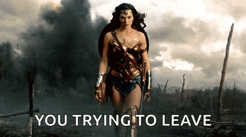 a woman in a wonder woman costume is standing in a field with the words you trying to leave below her