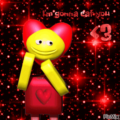 a smiley face holding a red heart with the words " i 'm gonna eat you " below it
