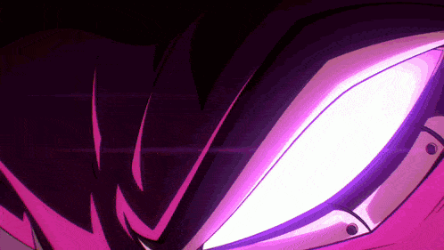 a close up of a person 's eyes with a purple glow