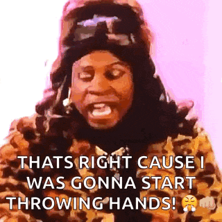 a woman wearing a leopard print coat and a hat is screaming .