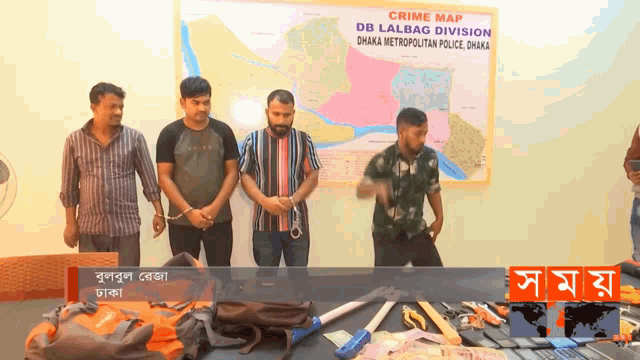 a group of men are standing in front of a crime map for the db lalbag division
