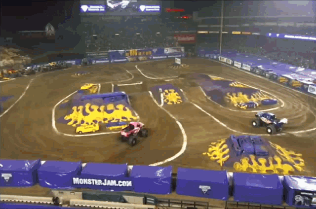 a monster jam race is being held in a stadium
