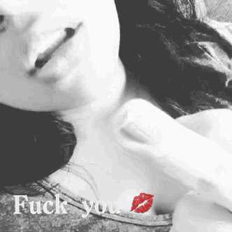 a black and white photo of a woman with the words " fuck you " written on it