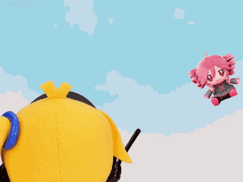 a yellow stuffed animal with headphones and a pink doll flying in the sky