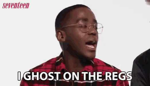 a man wearing glasses and a plaid shirt is talking and saying `` i ghost on the regs '' .