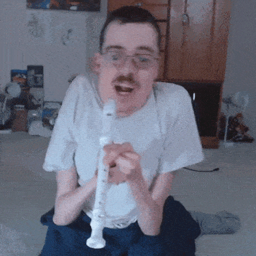 Playing The Flute Ricky Berwick GIF - Playing The Flute Ricky Berwick Making Music GIFs