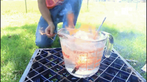 Simply Wrap Sparklers In Tape And Dip Them In Water For A Neat Trick On The Fourth Of July GIF - Diy Hack Crazyrussianhacker GIFs