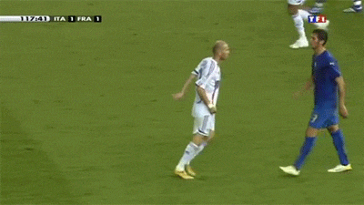 a soccer player wearing a number 10 jersey is walking on the field